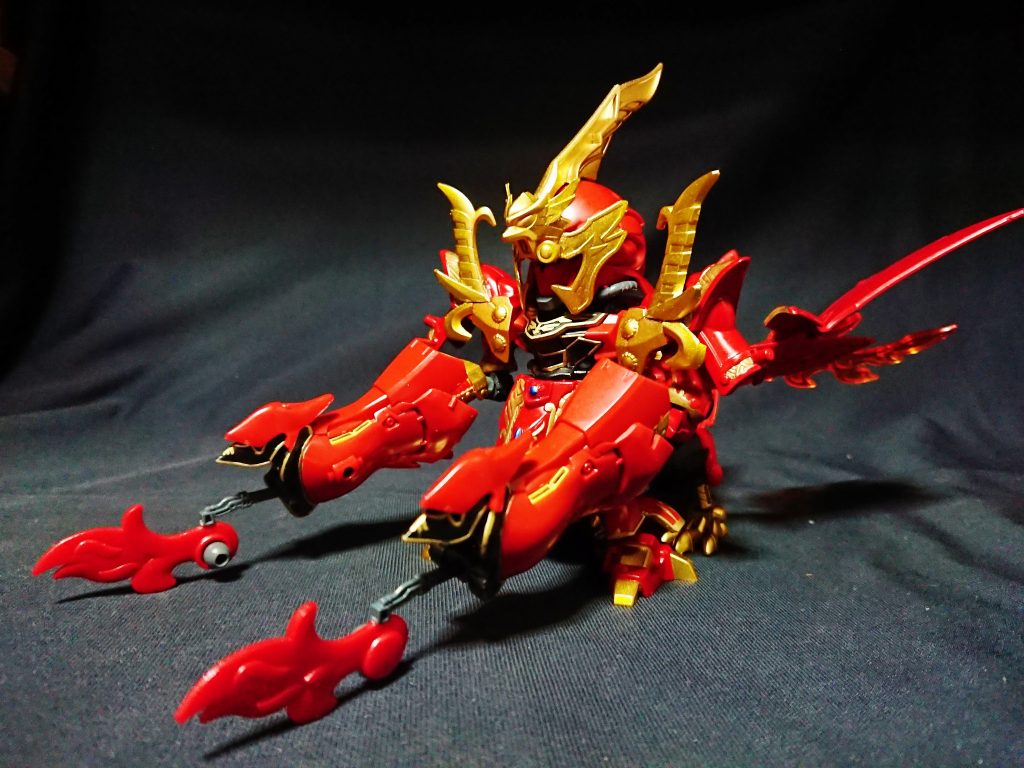 巨神体延長パーツを使用した武器の光炎大薙刀。
先端は光炎斧で持ち手部分は鈍器。
構えることもできるが、重いので支えが必要。