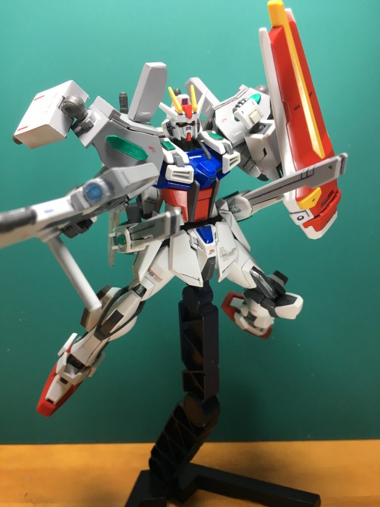 プラ板の箱組みでサーベルラックを追加。1.5mmシンチュウ線で接続しサーベルの着脱が可能。
 
 ビルダーズパーツHDの「MSウイング01」の長いウイングを使い主翼を追加。
 伸縮式ビームキャノンは接着してからもとのダボを削り落とし、1.2mmプラ板で適度に引っかかり、脱落しないようにしました。