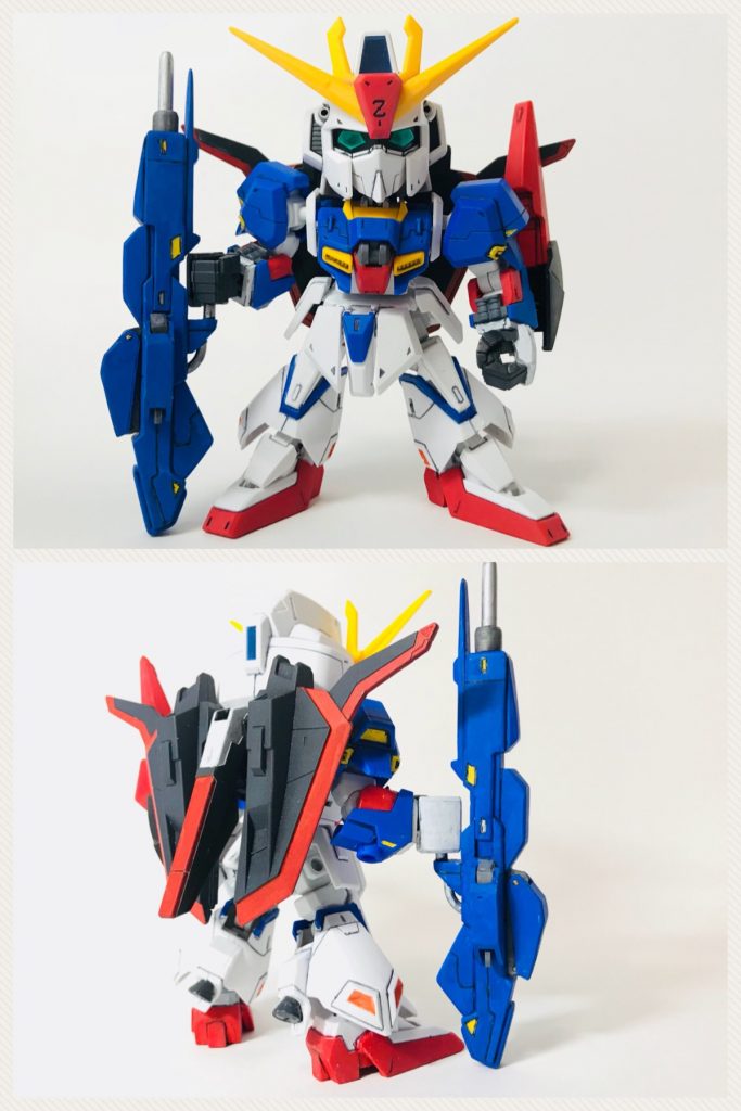 正面と背面。

## 加工箇所

・ハイパーメガランチャー製作
・アンテナのシャープ化
・CSフレーム適用
・足裏、ビームライフル、CSフレームの二の腕の肉抜き穴の塞ぎ
・腕の付け根の白パーツにある上側の切り欠きをプラ棒（1mm）で塞ぐ
・ビームライフルの銃口をピンバイスで開口
・ガンダムマーカーで各所を部分塗装（頭部のメインカメラ、リアカメラと瞳以外はシール不使用）
・つや消しトップコート