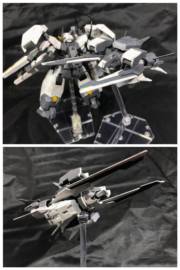 ## [プトレマイオスⅡアームズ]
この分離戦術の中核となるのがプトレマイオスⅡアームズである。

プトレマイオスⅡアームズは、機体両側に装備された大型クラビカルアンテナを用いて、分離し無人機となったセラヴィーガンダム・アミュティス、支援機セラ・ドニアザード、2機のプトレマイオスアームズの計4機の司令塔としての役割を果たすことが可能となっており、さらに機体上部に装備された小型ステルスフィールド発生装置および光学ステルス機能により姿を隠すことで優先的に司令塔潰されるリスクを下げるという戦闘方法をとることも可能である。

また、アームズの名が付いているものの、本家セラヴィーガンダムと同じく、セラヴィーガンダム・アミュティス本体は、こちらに設定されており、各機体を繋ぐトライアルフィールドは本機を中心として形成される。