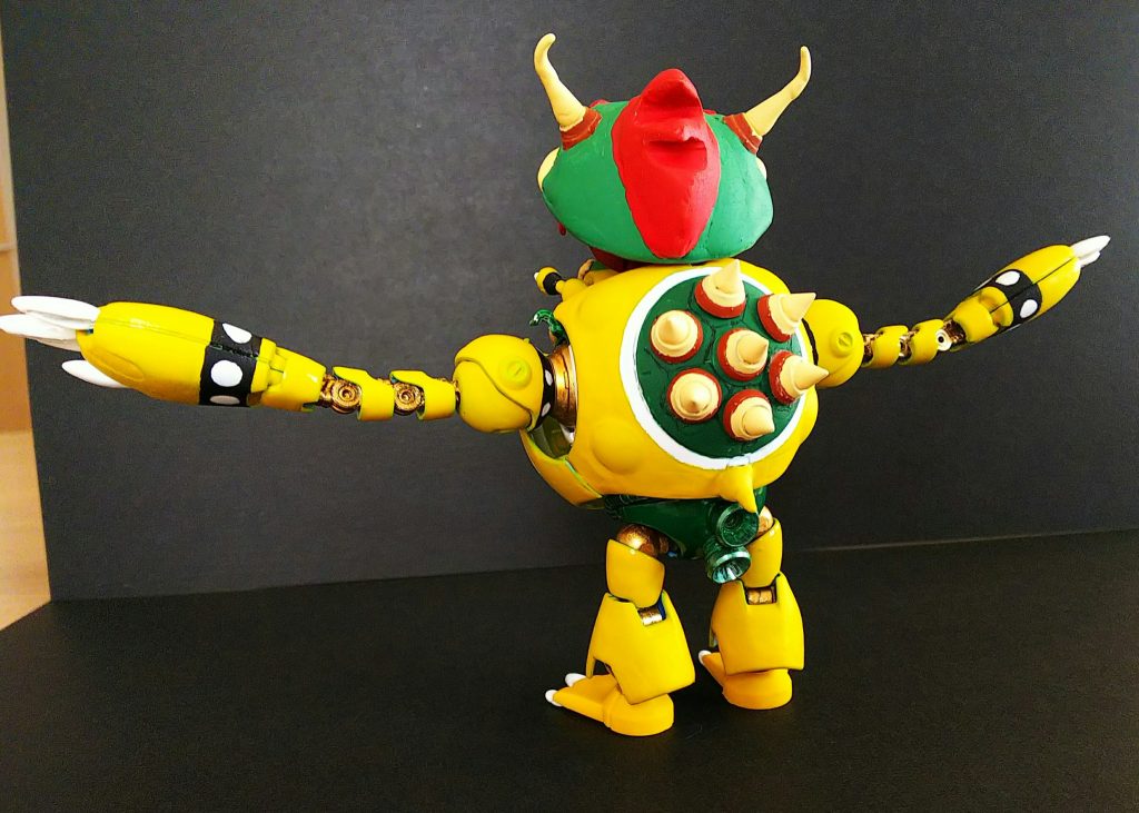 背中の穴の部分は埋めて、甲羅にして、スパイクパーツを甲羅のトゲにしました。
関節やバーニア部分はトップコートの艶消しをせずに、メタリックを際立たせました。