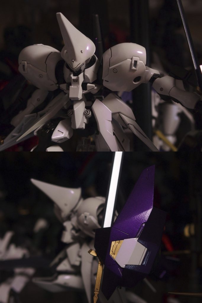 白は紫パールでねっとりコーティング。
パールは吹き過ぎると地色が黄ばむのが定説だが、
紫パールの場合、補色の影響か?地色がクリームグリーンに転ぶ。
なんとなくクリームグリーン→メタリックパープルというニセマジョーラっぽくなった。
※露出を下げまくって撮影した画像に変更しました。
面によって色が変わっているのが辛うじて解るかと。 
 
 
 
主武装はソードランス(斬撃も可能なランス)。