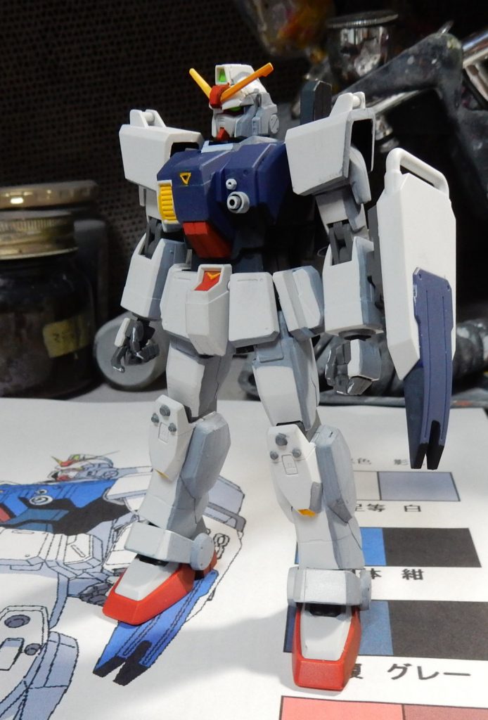 設定画を見ながら一通り影を塗りました。
アクリルガッシュはツルツルのプラ地よりザラザラのマット地の方が塗った時に弾かれにくいです。なので最初につや消しを吹いたのでした。
またはみ出してもマジックリンを綿棒に含ませて拭き取れます。これは水性アクリルでも使えるテク。