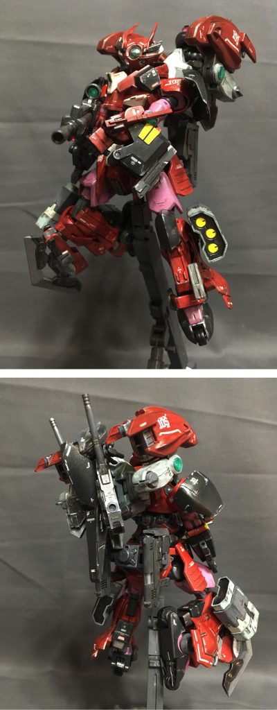 ラウンドキャリバー装備形態。これがグリモア・レッドウォーリアの標準となる形態。バックパックから伸びた両肩のラウンドバーニアは展開も含めてフレキシブルな動きを可能とし、急な旋回や急加速に対応。これはガンダム試作1号機FBを参考とした装備である。また、この両肩のブースターはGNコンデンサ兼、フィールド発生装置にもなっている。つまり、GNフィールドによる強固な防御が可能となっている。