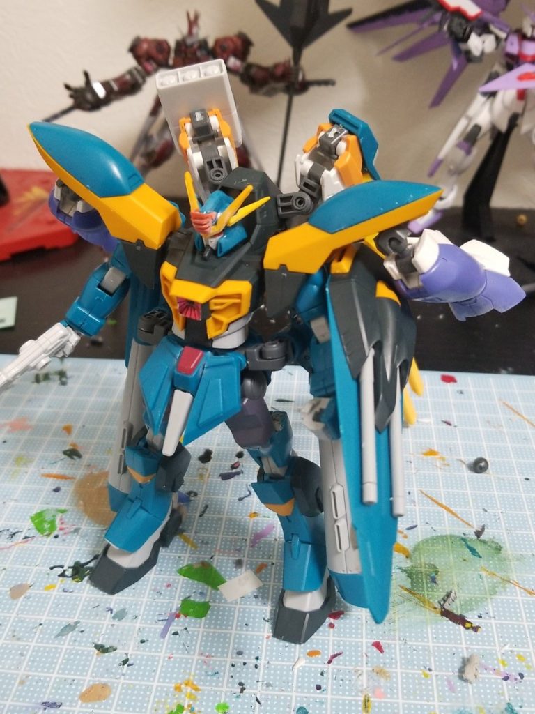 制作過程の写真撮り忘れました
/(^o^)\
大雑把に説明しますと
・本体は基本そのまま
・頭はアンテナを接着
・股関節はボールジョイントから軸式に変更
・バックパックに3ミリで穴を開けそこにバトルアームアームズの接続ジョイントを付ける
・そこにガンダムハルートの肩パーツを付けて3ミリで穴を開けミサイルポッドを付けたりアトラスガンダムの武器を接着したり
・肩のブースターを取り外してそこの接続部にキマリスヴィダールの接続ジョイントを付ける、さらにそこにアイズガンダムの脚部パーツをつけてバーニアを接着
・足のアーマー部分とシールドの内側ビームサーベルの基部を接着
・このままじゃ倒れるので踵にパーツを追加して踵を大きく