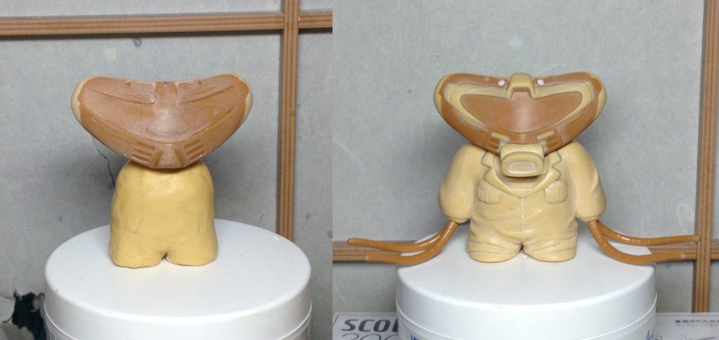 顔は旧キットのラインをなるべく活かすようにしました
シワを下半身側に多めに造形してツナギのダボダボ感を表現