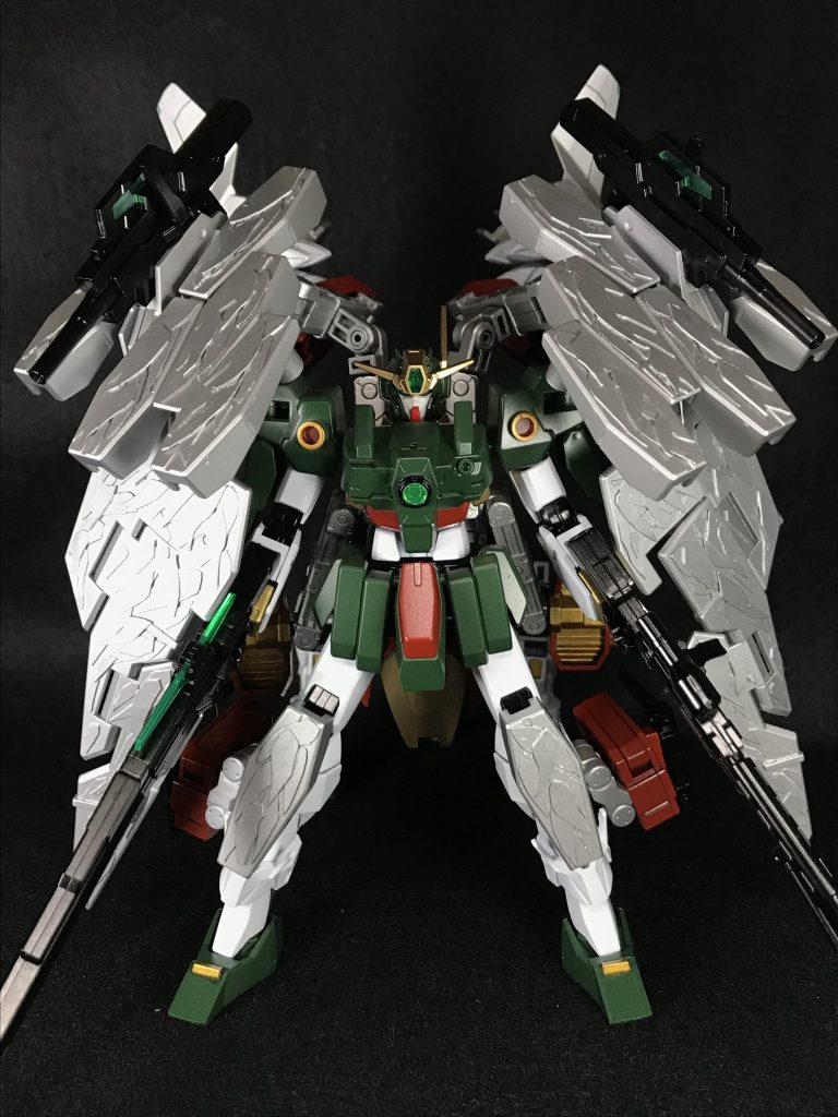 ## 機体設定
*HI-013 ケルディム・リバイブゼロ*
武装:
GNスナイパーライフル
GNスナイパーライフルⅡ
GNサブマシンガン×2
GNピストルⅡ×2
GNフェザーシールド
GNフェザービット×17
GNビームサーベル×2
GNソードⅡ×2
ケルディムサーガ、デュナメス 、オーライザーをミキシングしたヒイロ専用機体。
ケルディムガンダムの由来である智天使ケルビムをモチーフとしており4枚の翼を持つ他、Wガンダムゼロカスタムに似た胸中央のサーチアイや肩の丸い意匠が施されている。