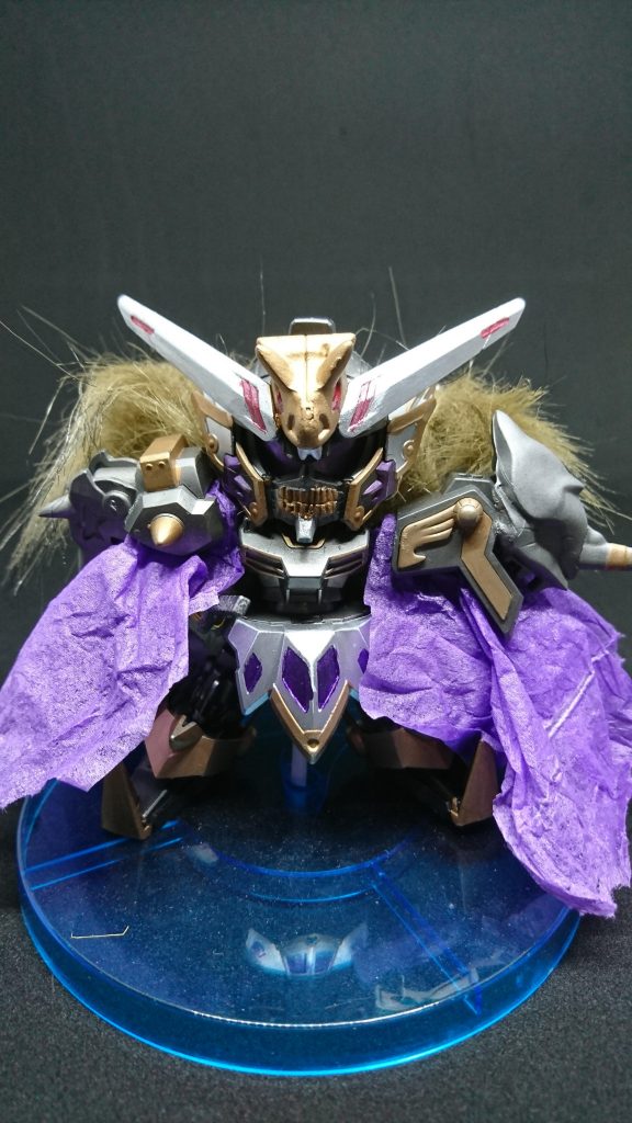 骸王頑駄無
突如GBNに現れた未確認のガンプラ
バグを引き起こし、ダイバーに襲いかかりガンプラを破壊してまわっている
目的は不明、運営が調査した結果
骸王頑駄無には「骸ノ陣羽」という装備で機動力が底上げされており攻撃を当てることができない状態である
ダイバーアカウントは確認され調査したがアカウントの持ち主は既に他界していたのとガンプラは親族が誤って廃棄したそうだ謎が深まるばかりだった