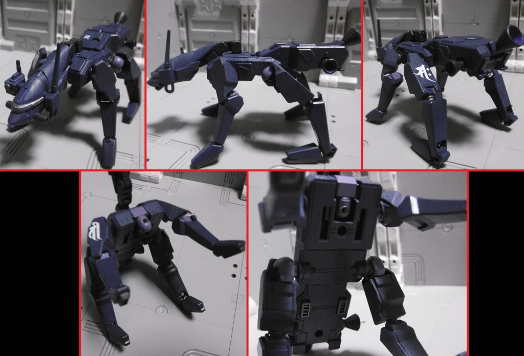 機体は『HGBC K9ドッグパック』に『HG バクゥ戦術偵察タイプ頭部ユニット(赤枠FUの付属品)』を繋いだだけ(後述)の、極めてシンプルな構造。
梵字は右前脚に【広目天】、左後ろ脚に【勢至菩薩】。それぞれ索敵性能&移動性能の強化。勢至は速度上昇効果としてよく使いますが、今回はその他にも意味付けあり。
本来の眼と思われるセンサーは記録用カメラ化。使わない時は格納するだけなので破壊リスク低下。5枚目のように威嚇(?)するのもありかなーと思いました。
