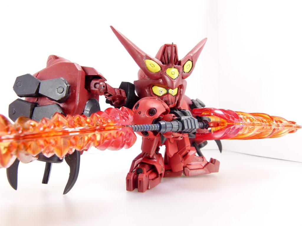 必殺技「鬼牙煉獄断」：地獄の炎で鍛え上げられた両刃の剣、オーガツインブレイドを装備。炎をまとった刀身で相手を一刀の下に切り捨てる。作中では２回とも必殺技対決となったため突撃後どのようにして切り捨てるかは不明だが、「両刃の炎の剣」でSDファンは曹操様を思い出さずにはいられない。「ごたくは済んだかァ！！」必殺技名は仮名です。「鬼」モチーフの関羽からも名を拝借。機武帝曹操の剣にダブルレイウイングを挟みます。