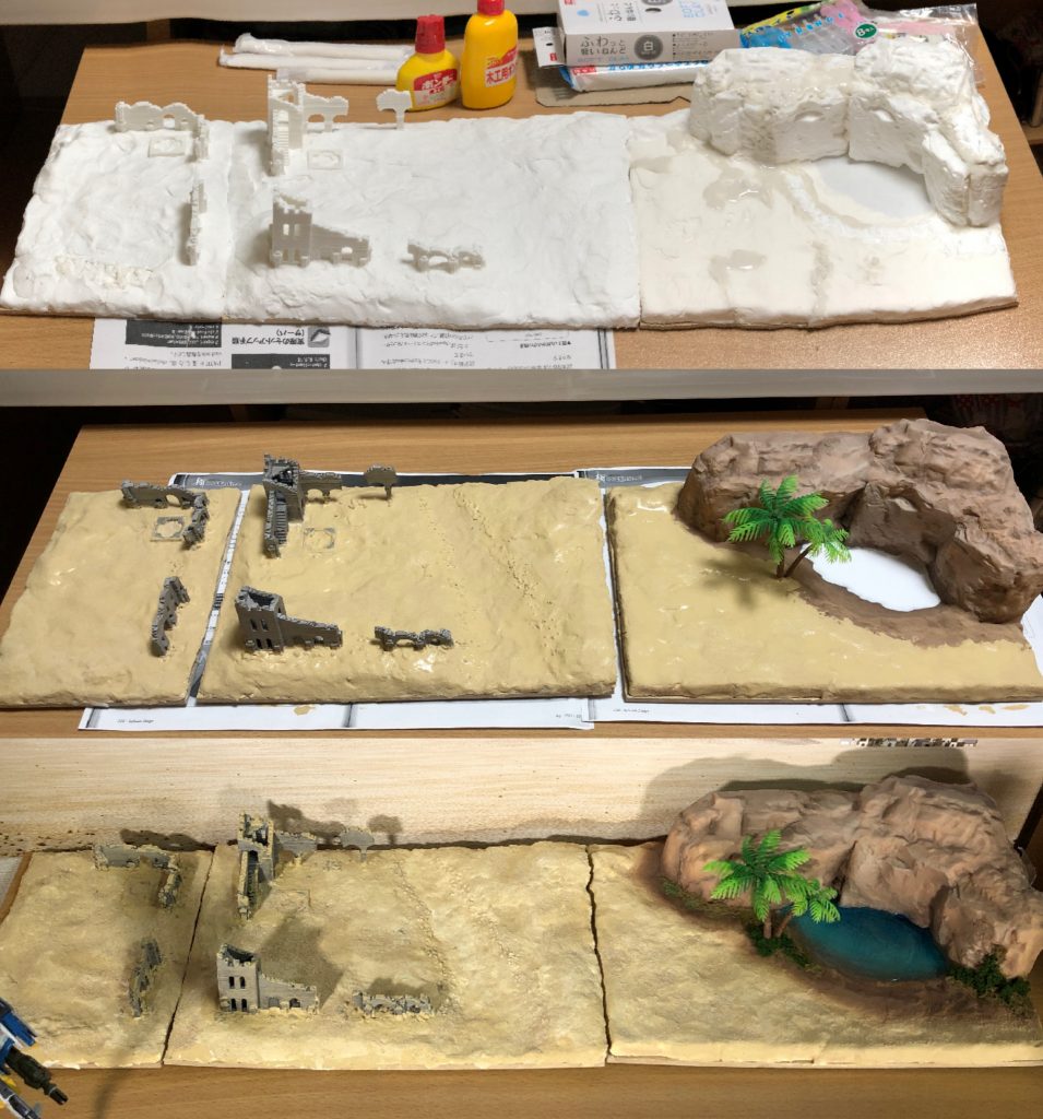 ジオラマベースは「廃墟」と「オアシス」をイメージしています。ほとんど100均の素材でできています。ベースは穿孔ボード、地面はかるい紙粘土、オアシスの水はジェルキャンドルです。砂漠の砂はテクスチャーペイント＋リアルサンドの配合を変えて陰影をつけてみました。色々なネットの製作記事を参考にさせていただきました。
背景紙は、箱庭技研 DSF-003 ジオラマシート [FREE 砂漠背景]を使用しています。