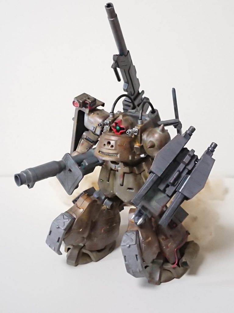 ジオン残党軍の所有するドムトローペンに追加ユニット一式を装備させた姿。残党が廃材や鹵獲品を駆使して製作した「アングリフ・ジャケット」を装備している。同一形状ではないが、同型の装備が複数製造されており、これらの装備がまとめて同じ名称で呼ばれている。単純な増加装甲ではなく、機動力や安定力向上のための機能付与を目的としている点が大きい。