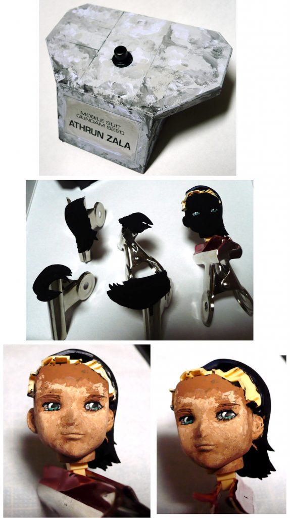 製作・塗装途中の画像があまりありません。

上段・台座は黒１色でしたがアクリルガッシュの黒とグレー、
ダンバイン（では無くて煌ギラーガ）を塗ったときに余ったラベンダーの３色を
程よく混ぜずに塗りたくって石っぽい質感にしました。

中段・アクリルガッシュの黒を筆塗りで下地塗装しました。
瞳の部分だけはその上に直接色を塗りました。

下段・アスランファンの御方にお見せするのは恐縮ですが
顔の塗装途中画像です。
肌色をやや濃く塗ってみたのですが
全国に３０００万人おられる（推測）
アスランファンの皆様にお叱りを受けそうだったので
明るい肌色をこの上に重ね塗りして手直ししました。
個人的にはコチラの方が男らしいかな～と思ったのですけど…