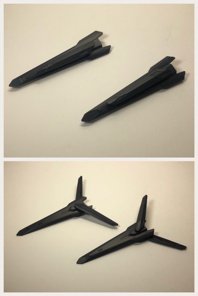 ーーーーーーーーーーーーーーーーーーーーーーーーーーーーーーーー
武装解説：ドラグーンユニット

SEEDストライカーパックに２基装備された遠隔操作兵器。
本機から分離後は量子通信により遠隔操作を行い、オールレンジな射撃が可能となっている。
また左右に翼を展開することができ突撃攻撃を行うこともできる他、
２基を同時使用したビームバリア展開もできる多機能ドラグーンユニットである。
ーーーーーーーーーーーーーーーーーーーーーーーーーーーーーーーー

本形態におけるメイン兵装とも言えるのがこのドラグーンユニットです。
「バインダーガン」の両面３ミリ穴に「ノーネイムライフル」の小翼を取り付けています。

ビームバリアは文房具のクリアバインダーの表紙を切り抜いて制作しました。



続いて＜ストライカーパックの変形機構＞の紹介です。
通常時では、「Φ」字を象っていた形状をしていますが各部を可動させることで形状を大きく変更することができます。