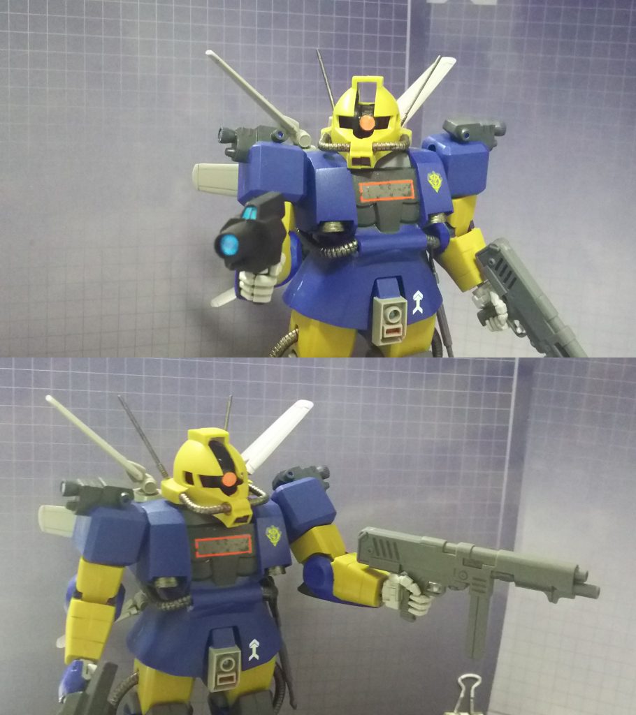 カメラガンのレンズもパーツ追加。
MMP-80マシンガンとの二丁拳銃。
ビルダーズパーツのMSハンド取付軸が無改造で固定できたりします。
左腰のヒートホークは旧キット武器セットの出っ張りに合わせサイドアーマーに切り欠きを作り差し込みました。