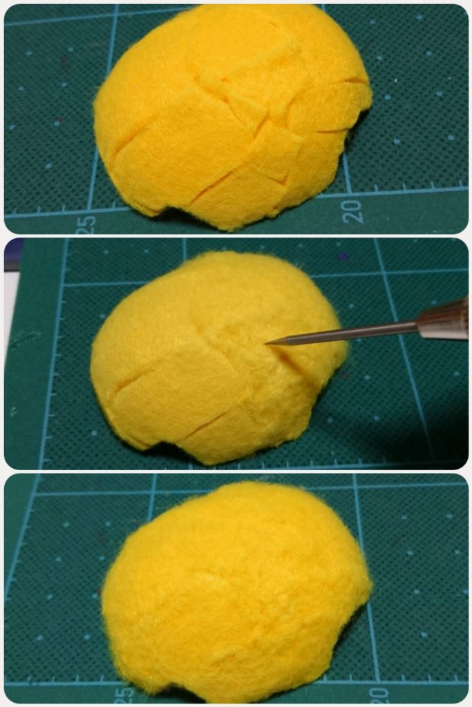 フェルトを適当に張り付けて、けがき針のような尖ったもので擦ってあげると会わせ目が消えます。