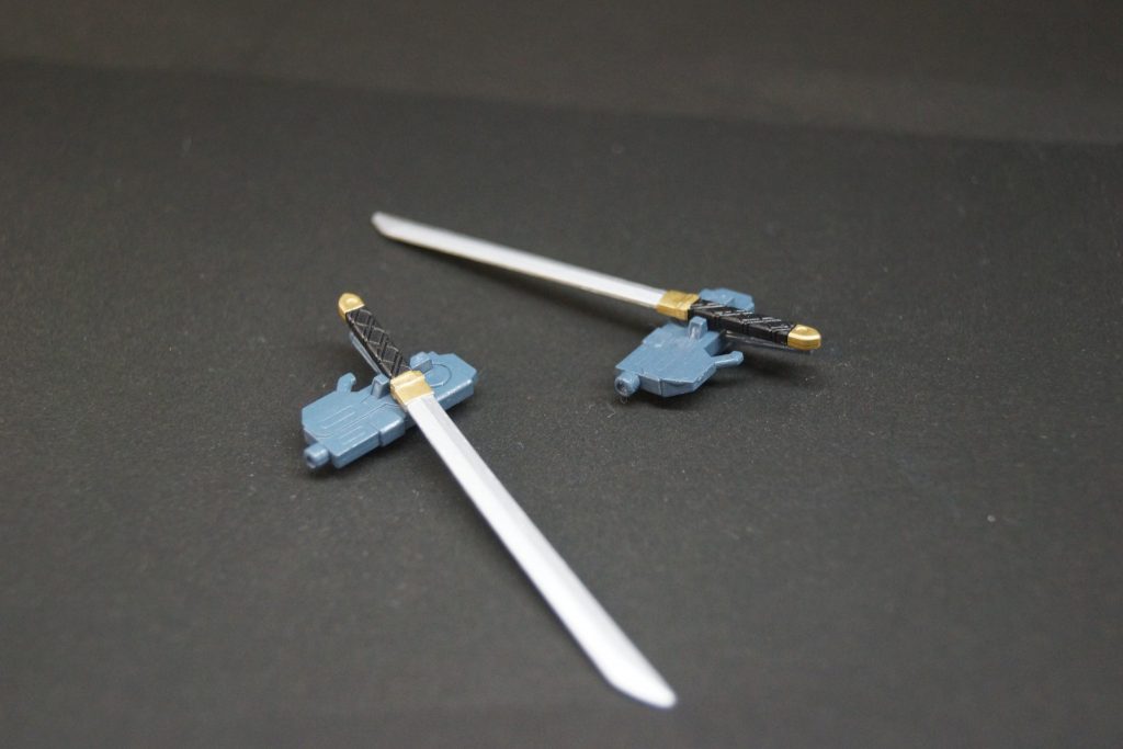 　ソードピストル:（椿の刀）
　...果たしてこれは実体剣(刀ですが)なのか？「実体剣には花の名前を付ける」というポリシーが仇になりました(^_^;)ソードなのかピストルなのかわからないヤツが現れるとは...　かっこが付いているのはそのためです。
　BB戦士ストライクノワールに付属のビームライフルショーティーを
削って、日本刀をくっつけています。