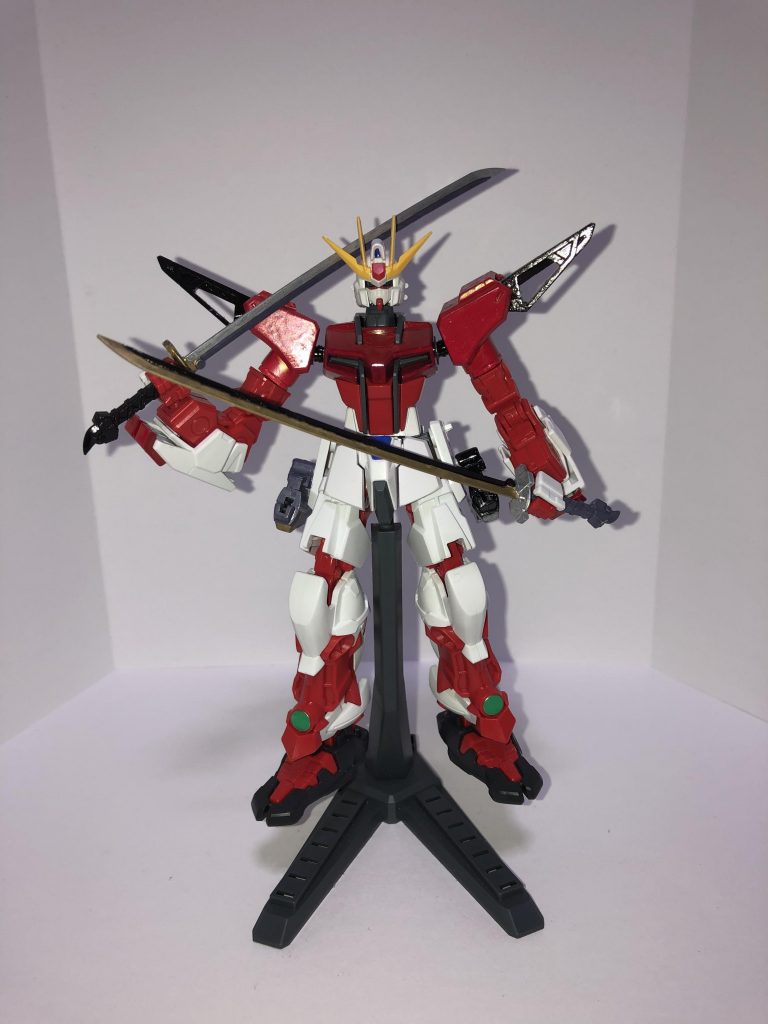 だが、テスト中に戦闘に巻き込まれ本機は大破し、そのまま廃棄となってしまう

そして宇宙ではデュランダルの計画を知ったある赤服のZAFT兵が開発途中だったデスティニーのパーツを奪取し逃亡
まだ未完成品だった事もあり、データ流出を恐れ奪還ではなく抹消される事になった

追撃を受け逃亡には失敗、盗んだパーツも宇宙に放り出され消息不明になるも偶然通りかかったジャンク屋によって助けられ奇跡的に生還

事情を話し、消失ポイント付近でパーツの捜索を依頼
そしてその頃テスト機も又ジャンク屋へと流れ着く

パーツは発見されるも損傷が酷くそこからデスティニーの復元は不可能だったが、同時期に流れ着いたXINGの素体にフラッシュエッジⅡの付いた肩周りやバッテリー式だった動力をデスティニーに搭載予定だった物を改造しストライクタイプの胴体に組み込む事で本機は完成した