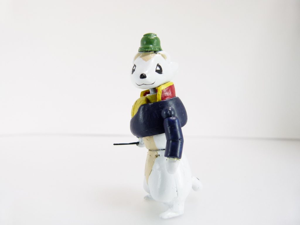 *ロンメル隊長*：フォース・「第七機甲師団」のリーダー。
ぬいぐるみやプラモが欲しかったのは自分だけではないはず。

旧ＧＵＮＳＴＡではレギュレーションから外れていましたが単独で投稿していました。
下半身はポケプラおまけピカチュウ、上半身はジャンクのブースターなどから。
肩は球体ジョイントで自由に曲げられますが、現在までに左肩を２回壊しています。
右手に持っているのは本来では鞭ですが、サイズの関係上指揮棒にしました。こちらと帽子はタミヤのスケールモデルからの流用。