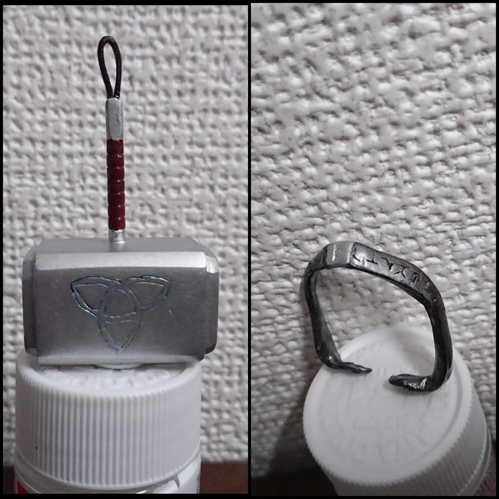 左がムジョルニア、右がメギンギョルズ(ベルト)
時期的に製作中に映画で壊される場面を観ることになりましたが、やはりソーの代名詞であるからして外せません。デザインとしてはレリーフは彫れなかったのですが、トリケトラは彫ってあります。あと写真では見えませんが上部の円形にルーン文字を円を描くように羅列してます
バーサルソードの刃部分を切除し、パテをガン盛り。柄にもパテを盛って牛革製のヒモを着け全体の形を整えて完成。内部をかなり抜いたつもりだったのですが、ペーパーウェイトとして使えるんじゃないかってくらい重い。持たせるのに苦労します。
メギンギョルズは中央の銀部分はルーン文字のソーン、他はルーン文字