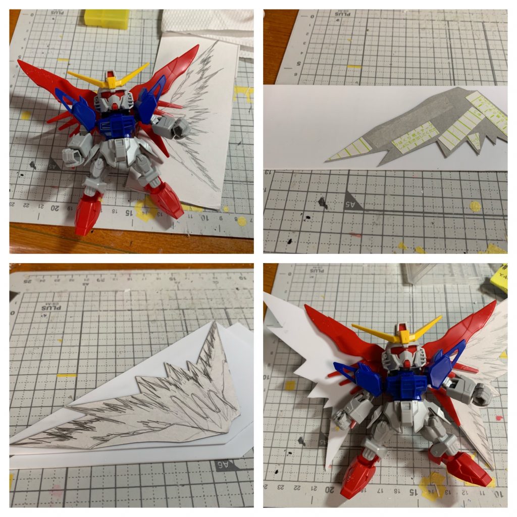 光の翼の制作
紙(ガンプラの底箱)で型紙を作り、同じ形にプラ板を二枚切り出しました。