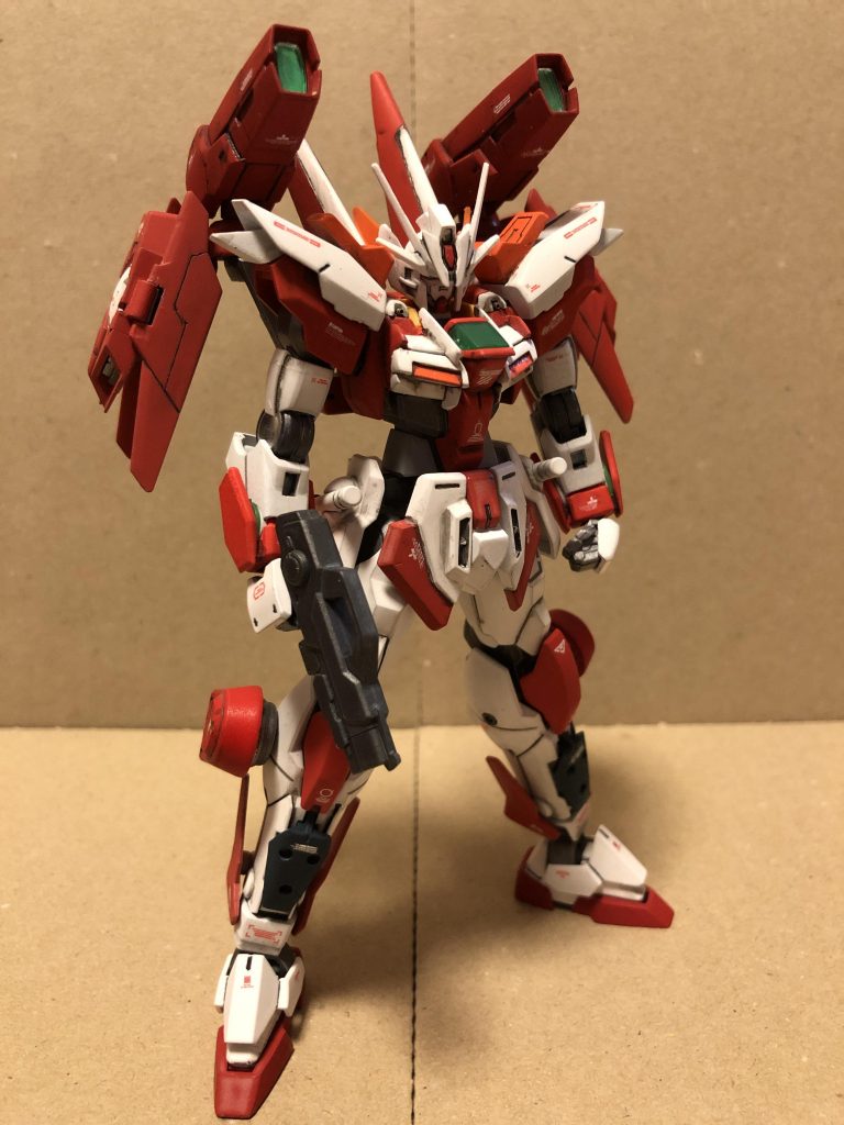 ダブルオーフレイム・プログレスの標準装備。バックパックに2基のGNドライブユニットを搭載し、それに直結される形でGNフレイムキャノンを装備。両脚部サイドにはスラスターを追加してある。手持ちの武装は使い回しのよいOガンダム用のビームライフルを携行する。この形態では当然トランザムシステムの使用が可能であり、またGNフィールドが展開できるので、シールドは携行しないことが多い。