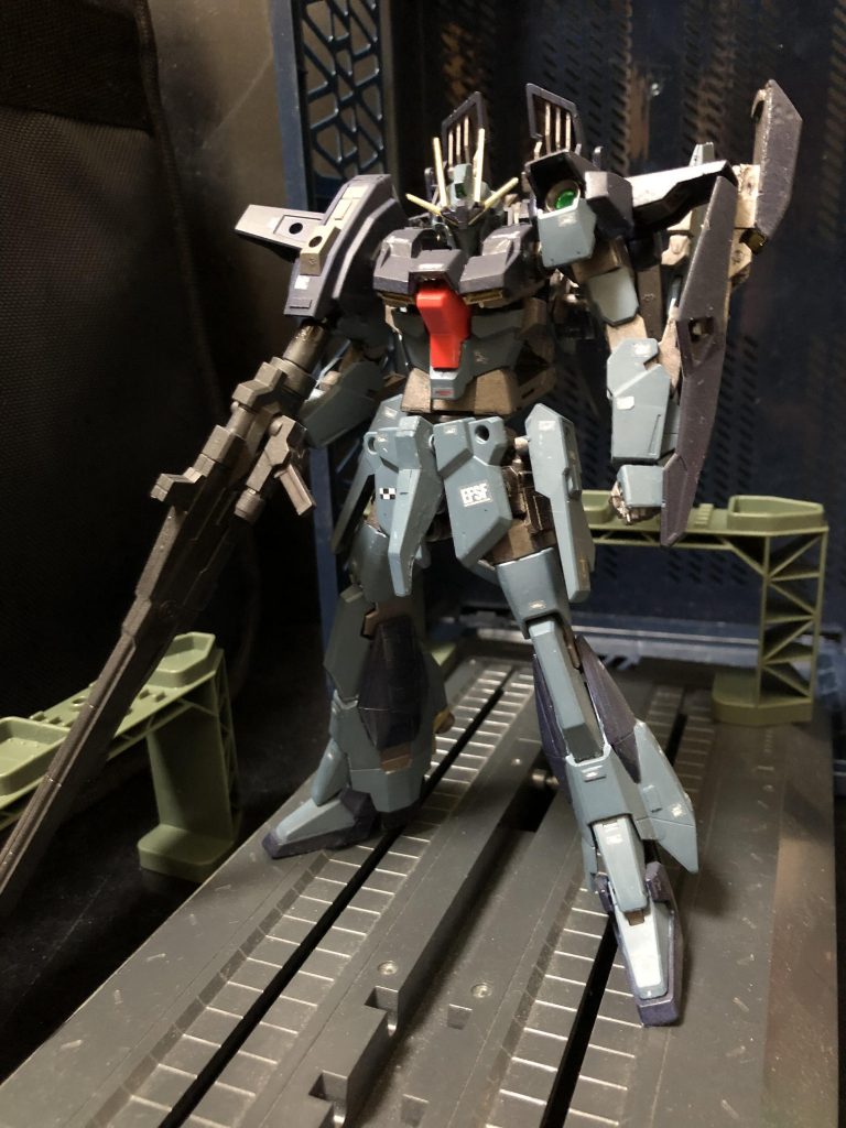 『ビルドファイターズトライにて“コウサカ・ユウマ”が、“リ・ガズィ”をベースに改造・制作したガンプラ。
ガンプラの完成度を競う「アーティスティック・ガンプラ・コンテスト」に於いてグランプリを獲得したガンプラであり、その完成度と秘めたるポテンシャルの高さは“メイジン・カワグチ”からも一目置かれている。