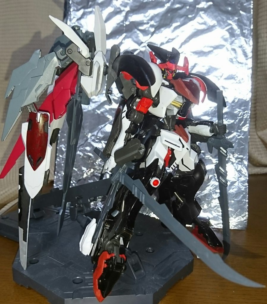 ガンダム・ラース
プライドの本来の姿であり、本機の腕部、胸部、脚部の計6機リアクターのリミッターを解放した姿である。
主にガンダム・フレーム、モビルアーマーの存在を関知すると強制的にこの姿になる。その姿は自身に歯向かう者に対しての憤怒<ラース>そのものである。