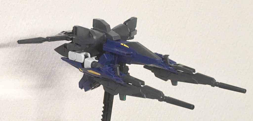 「ビルドブースターMk-Ⅱユニット」

このユニットはグリプス戦役時に計画されていたガンダムMk-Ⅱのフルアーマー強化プランの１つである、Ｇディフェンサーのセカンドプランとして開発途中のまま保管されていたユニットをベースにしている。

ラプラス事変後にアナハイムエレクトロニクスのサイアム・ビスト派の幹部が、保管されていたガンダムMk-Ⅱと併せて秘密裏にミネバ一派に譲渡した。

その後ガランシェール隊に入隊したタクヤ・イレイがビームマグナム対策用のカスタマイズを施した。

ＡＩ搭載のコアポッド合体による自動操縦で機体から分離して単独で行動可能。