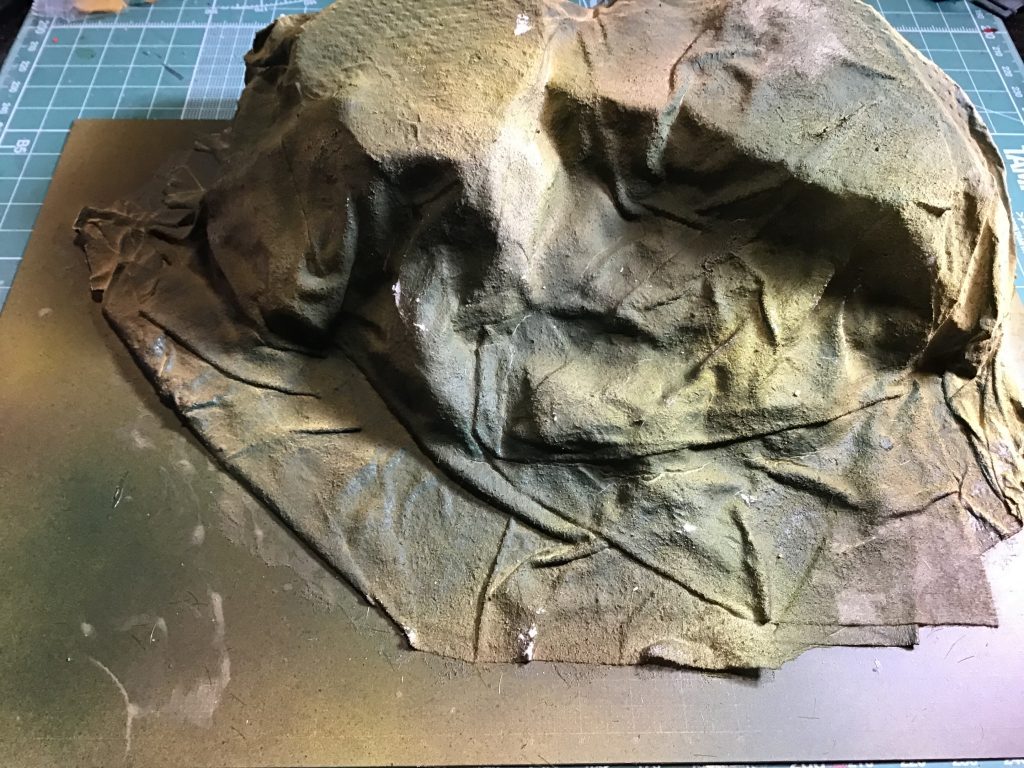 発泡スチロールの上に便座汚れシートを被せて石膏水をかけてスプレーで着色