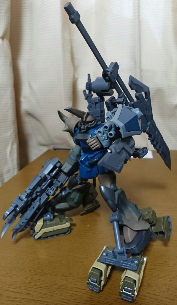 ジオン軍が大破したグフ・カスタムをより陸戦に特化させた改造機。
改造に伴い本機には有り合わせのパーツや急造されたパーツを使っている為機体バランスが不安定になっているがパイロットの技量でそれをカバーしている。