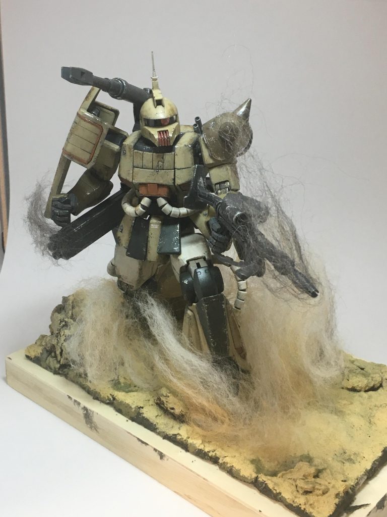 砂塵の中の攻防戦–2枚目/制作者：またたびだんご