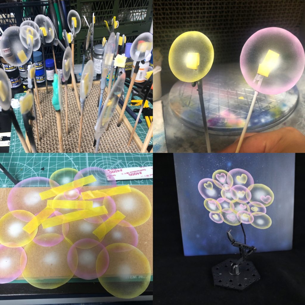 ポワポワ。
サークルカッターでプラ板をランダムなサイズで丸く切る。
円の外周と中心にホワイトを吹く。
外周にクリアカラーで色をつける。
ポワポワたちが……!?
合体してキングポワポワに!!
ハートを適当散りばめランナー切り出して棒状にして炙って角度つけました。
アクションベースにブスって刺せば完了。