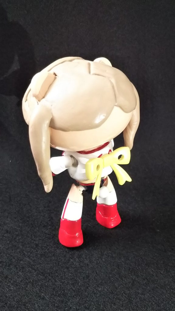 頑張って自立！のバックショット。
リボンがワンポイントです。