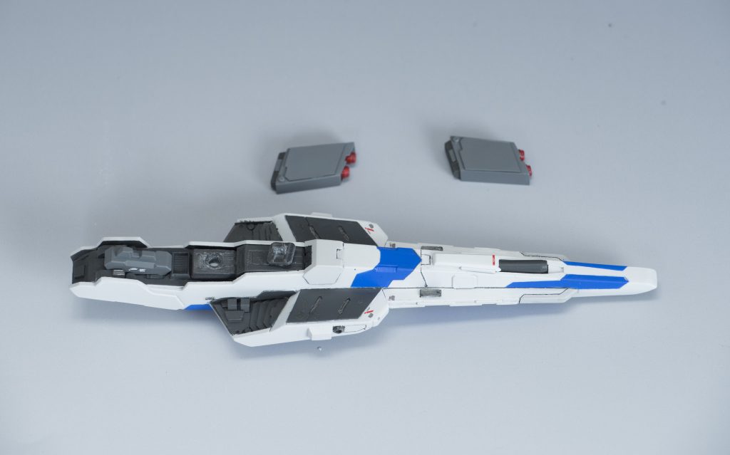 シールドはフルスクラッチなので一番、手間がかかりました(-_-;)
デザインもストライクゼータそのままではなく、小型化して、元々の形状よりも取り回しが良くなるような形状にしてみました。
ミサイルポッドもプラ板とプラ棒の組み合わせで製作し、ネオジム磁石を仕込んだので着脱できます（本当はこれを活かしてガトリングガンとか他の武器も付けられるようにしたけど気力が出んかった………！）

ビームライフルはハイニューのものをベースにニューとギラ・ズール（センサーのところのみ）のものを組み合わせてます。
これも結構、形状で悩んだところですね。