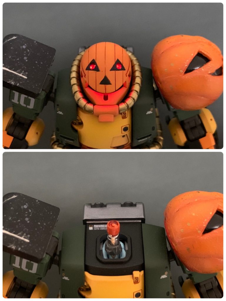 頭のカボチャ模様は元にあるスジボリの間に新しい線を追加して書きました。直線だから楽勝かと思ったらガイドテープを直線に貼るのが出来なくて四苦八苦…

モノアイはクリヤーのHアイズにクリヤーピンクを塗ってありますが…

ミライトが赤なので点灯すると意味なかったり(⌒-⌒; )