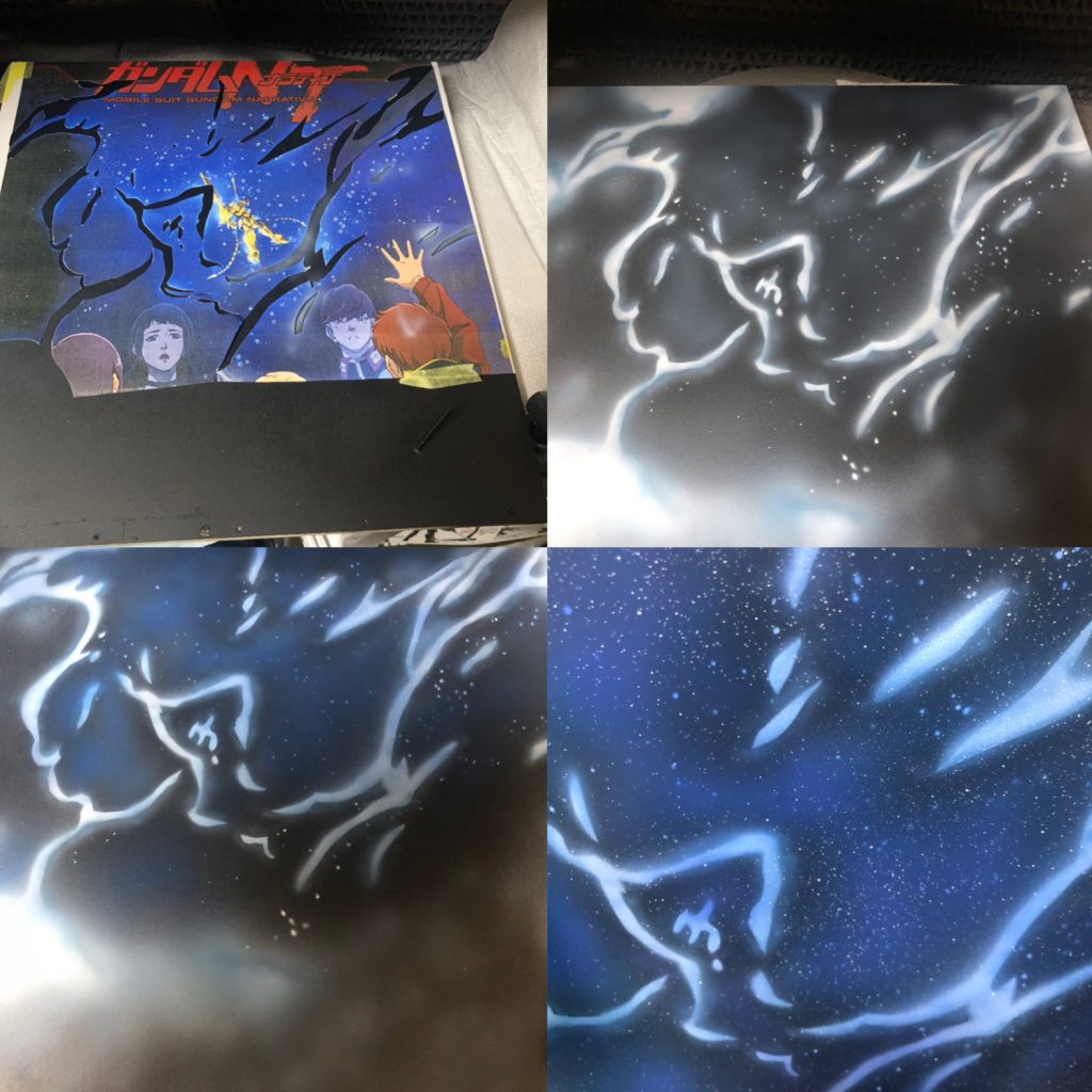 背景。
マスキング塗装です。拾い画をコンビニでA3印刷して切り抜いてます。
ご尊顔に塗料を2度ぶっかけて修正。
修正後最後の星をまぶす段階で塗料つけすぎてしまい…やり直ししました。
塗料吹いたらめくれてしまいそうなとこだけ裏からテープ留めしてます。きっちりやると白と黒の境界がハッキリしてしまいぼかすのが大変になります。板と紙の間に少し隙間がある位がきれいなグラデーションになります。