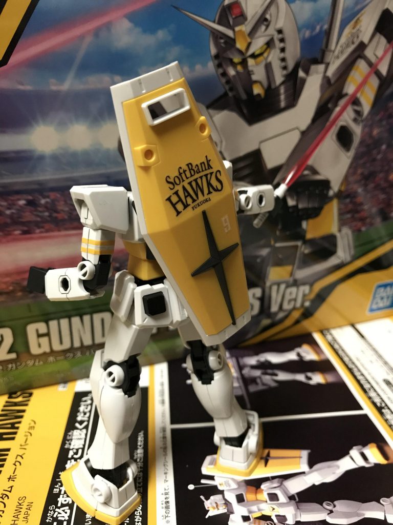 背中で語る男…的な