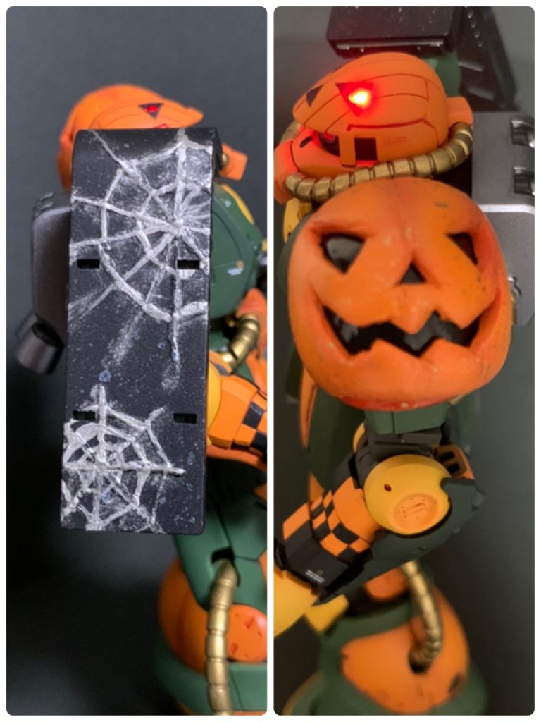 右肩は溶きパテで蜘蛛の巣を書いて凹凸を作った後に黒サフ→エナメルのチタンシルバーでなぞってます。
左肩のカボチャはスパイクを切り落とした後にエポパテで先に丸く土台を作った後にワセリンを塗って
硬化後にカボチャ🎃用のエポパテを再度盛って整形しました。
かなーり雑な作りですが開き直ってそのまま進めております(⌒-⌒; )
蜘蛛の巣の方はホワイトパール、カボチャの方はゴールドをスパッタリングで塗って誤魔化しを試みております(^^)b