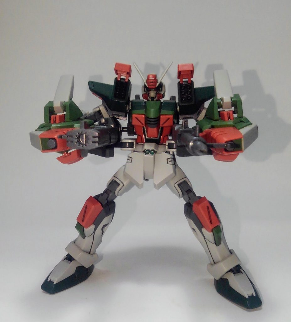 切り札のフルバースト。手甲を腰武装のグリップ部分に噛み合う様に形造り、接続して見える様に構えさせているだけです。それっぽいと思いますよ？