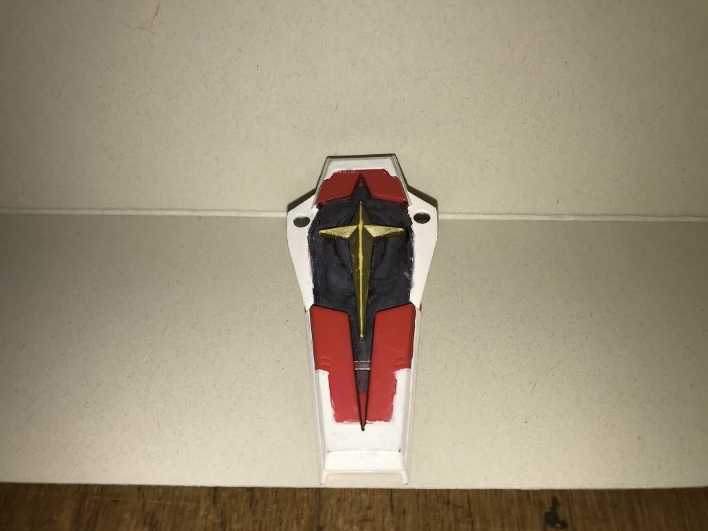 ハイパーインパルスシールド表面、裏側、内部など、全体がアルティメット細胞で構成されているこの形態の専用シールド。素体形態が装備するインパルスシールドと同じ形状が、その構造や性能は、全く別物である。シールド自体の強度と耐久性は極めて高いレベルだが、アルティメット細胞の力によって、このシールド自体は常時完全無敵状態である為、あらゆる攻撃が一切効かない。勿論名ばかりではなく、本当の意味で完全無敵なので、ジェネシスのような戦略兵器や核ミサイルはおろか、ブラックホールや時間操作、細胞や遺伝子の構造自体の組み替え、月光蝶システムなど、通常ならば絶対に対応できない攻撃や特殊能力すらも完璧に防ぐ事ができる。挙句の果ては、因果律操作を用いても、突破・破壊・無効化できない。つまり、このシールドは、正真正銘どんな攻撃にも一切傷付かない完全無敵の盾である。さらに、内蔵されたビームシールド発生装置を起動する事で、膨大なエネルギーを消費し、シールド本体と同様の完全無敵状態のエネルギーフィールドを広範囲に展開する事ができ、防御範囲の拡大さえも可能にする。また、シールド内部には一斉発射式のビーム砲8門を内蔵しているが、これは上記の必殺技「レインボーファイナリュージョン」を発動する際に起動する。こちらのビーム砲やシールド内部も、シールド同様に常時完全無敵状態である為、弱点として狙われても、暴発する事もなく、内部が破壊される恐れはない。ただし、凄まじい威力の攻撃が当たった場合、シールド自体を弾き飛ばされたり、シールドごと遠くに吹き飛ばされたりするなど、衝撃自体を完璧に無効化できる訳ではない。この点は、本機やパイロットがその衝撃に耐えられるかが問題になる。ちなみに、プリズムソードのシールド部分にもハイパーインパルスシールドと同じ原理が用いられており、防御範囲は狭いが、こちらも無敵の防御力を誇る。※絶対防御と言うに相応しいこちらのシールドの独自設定は、仮面ライダーエグゼイド ムテキゲーマーの完全無敵能力を参考にしています。