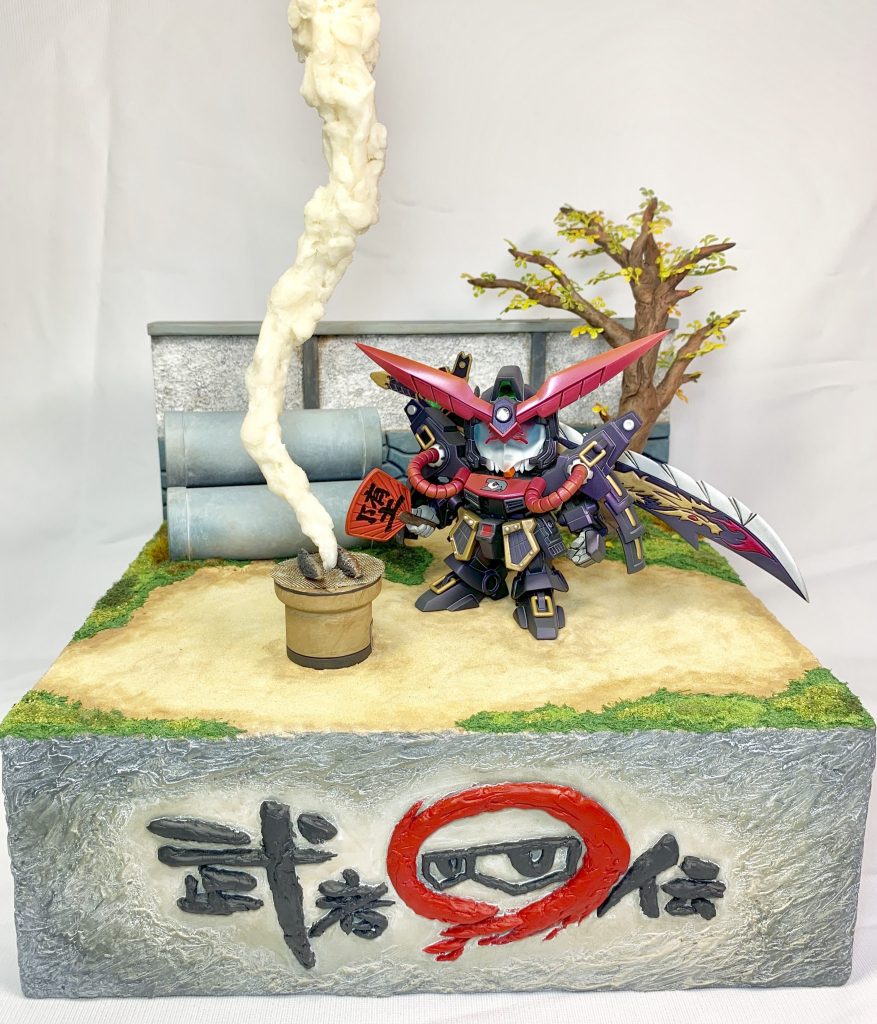 全体図　コマで確認できる七輪、土管に加えて塀と木を追加して空き地っぽいジオラマにしています。