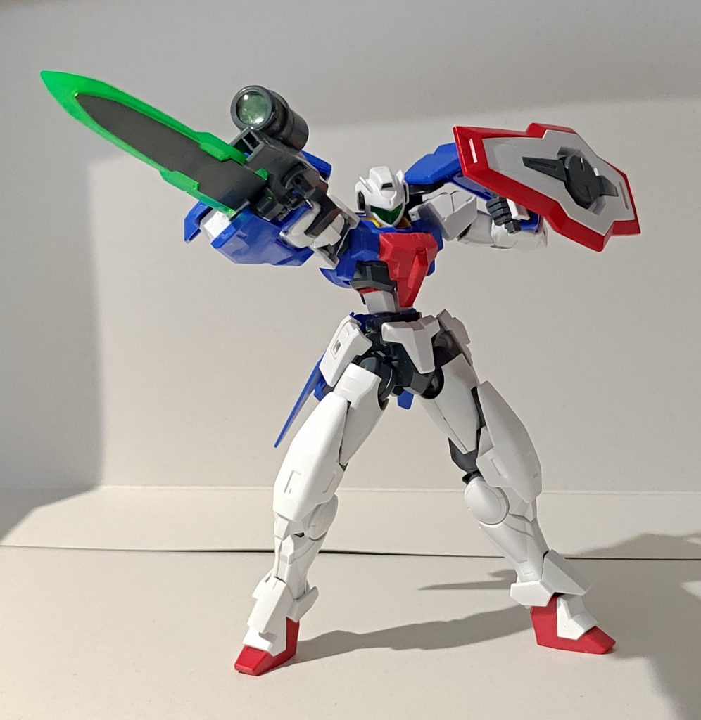 武装
GNソードⅢを基にGNソード改を使用し小型化、銃口を3門から1門へ減少、側面にGNコンデンサーを装備
ビームサーベルとガンダムシールドは0ガンダムのものをそのまま装備