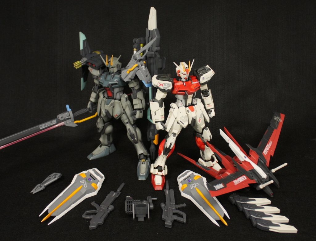 初期のMGストライクに付属していたソード/ランチャーストライカーも合わせて製作しましたが、配色がおもちゃっぽかったので渋めのカラーリングに変えてみました。

以上、最後までご覧頂きありがとうございました！