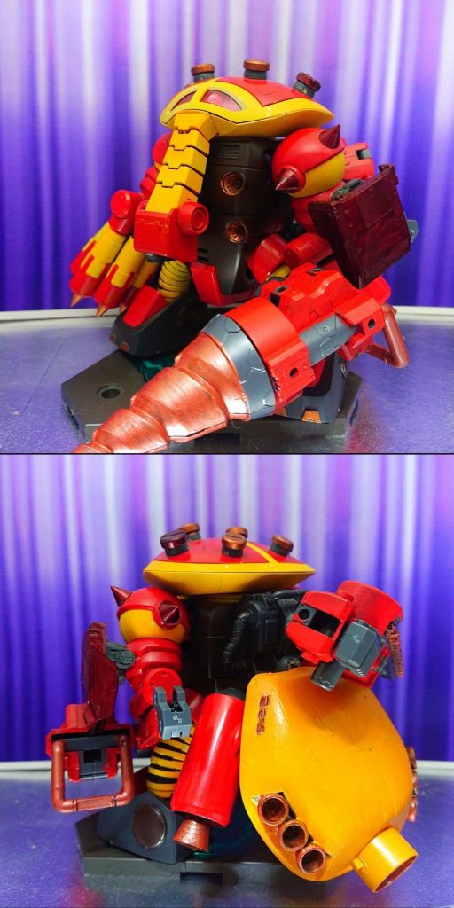 大きな変更点は、機体重量の関係で左腕をマニピュレーターからハードポイントに変更したことですかね。
バックパックも大きく改修。
シザーソードを撤去し、予備の武器をマウント出来るハードポイントにし、バックパック真ん中に装備されていたプロペラントブースターはリアスカート左右へ移動。
巨大なリアスカートはバーニアスラスター兼ホバーユニットという設定。