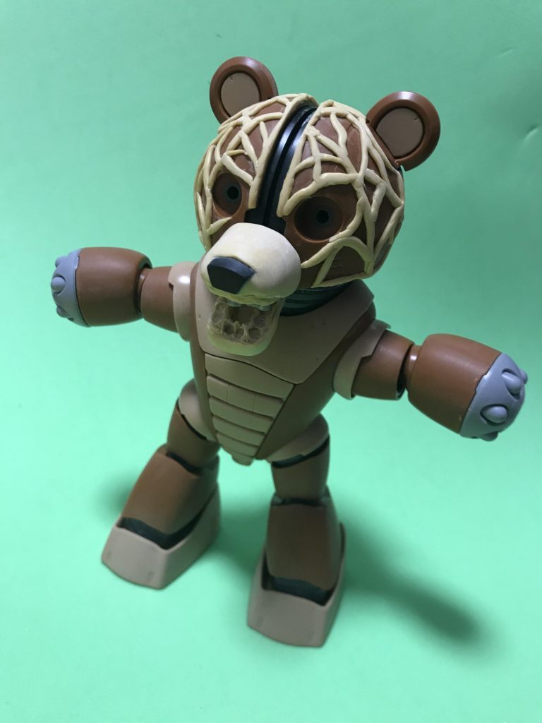 熊っぽい口元とメロンの網目をパテをペタペタ。