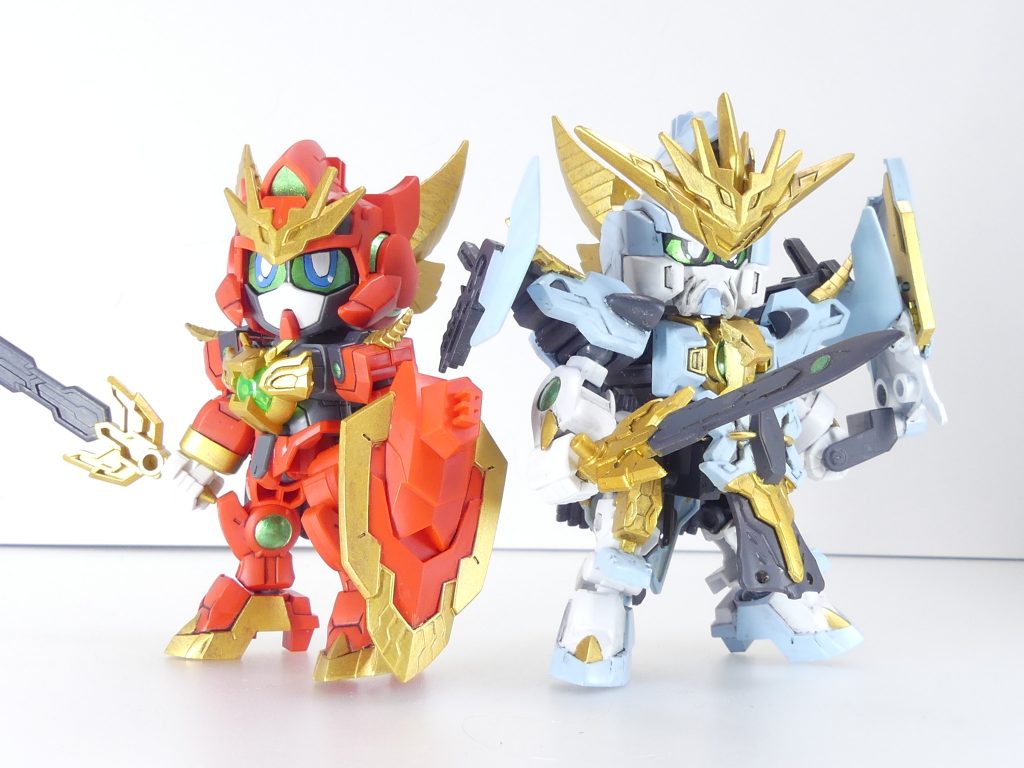 【ガンプラデータ】ベース:SD三国創傑伝 黄忠ガンダムデュナメス使用キット:SDBD:R ヴァルキランダーポケプラ ブラックキュレム など今回は「GBNW」とはいえちょっと番外編(既に物語が第一シーズン終盤になっているあたりは今後に響いてきます)。冒頭小説パートのような*「ヴァルキランダーの仲間」*作りです。ヴァルキ、コアコンが開催中のコアガンダム一族を除くと「リライズ」ガンプラでは現時点トップの投稿数(1/6現在)なのですが・・・SD準拠のシステマチックな組み替え変形などもあり、大規模な改造には行きにくいのも事実。そこでヴァルキパーツを使ったミキシングと相成りました。なお、ヴァルキ本体はアヴァランチレックスバスターレビュー用に2個目を買い足し共闘を可能にしています。今回は金パーツの塗り直し、目をはじめ一部設定通りの塗装追加・・・と言った部分塗装を行ったバージョンです。※ヴァルキ単体の紹介はこちら※