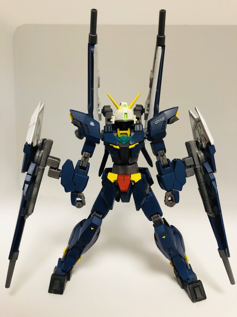## プルトニューンガンダム前面

機体説明

　矮惑星となった*冥王星*の名前を関するコアガンダムの装備。惑星から外れた命名であるが、基本的な装備やユニットごとの差異はほかのプラネッツシステムと同じである。
　見た目とカラーリングの通り、TRシリーズ(特に*ギャプランⅡ*、*アドバンスド・ヘイズル*)の要素が強い。これはコアガンダムとTR-6ウーンドウォートの類似性に注目し、そのコンセプトを発展させたからである。
　高速戦闘とシールドウェポンの強化に重きが置かれた機体……であるが、その後この機体は廃案になり、実際に作製されることはなかった。

　*そう、ジュピターヴガンダムの登場である。*

　より洗練されたコンセプトと武装を持つジュピターヴガンダムによりこの機体はGP04ガーベラのように存在が抹消されてしまったのである。
　しかし廃案にすることを惜しく感じたヒロトは暫定措置として惑星(プラネッツ)から外れたもう一つの装備案としてプルトニューンの名前を与えるに至った。
　ただしこの名はあくまでも暫定措置。仮称であり、*彼の頭の中にのみ存在する設定である。*
　冥王星の名を冠するのに相応しい機体が近い未来に現れた時にはこの機体の名はまた別の名に置き換わるのであろう。

　コアガンダム共々ティターンズカラーにされているが、これもプラネッツシステムから外れたからである。もし本採用されていた場合はコアガンダムに合わせて白を基調としたアーマーとなっていたであろう。*白きウサギのように。*