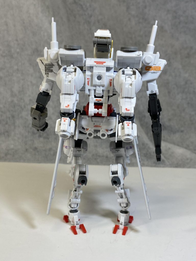 軽装状態、前後横から。

柔軟性のある多関節鳥脚でトップヘビーな不安定さを制御する事で重力下ても脅威的な運動性を発揮する。

第一話「あてなき旅立ち」ではコロニー内へ侵攻して来た宇宙移民解放戦線（ 通称　ジオン）の
マシン・ソルジャー　ガウディ2機をビームガン
使用不可能状態で撃破している。