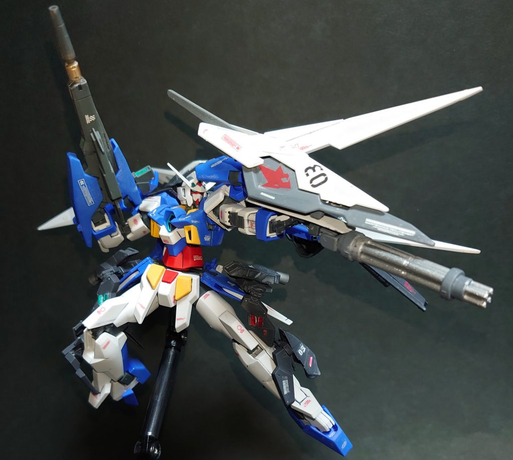 また、シグルブレイドの代わりにドッズガトリングガンを装備可能です。
ハイパードッズライフルの取り回しが悪いため、連射性の高いガトリングで補うという算段。
皮肉にも宿敵クロノスの武器構成と同じだったり・・。

こちらはパワードアームズパワーダーから製作。
何となく察した方がいるかもしれませんが、このガトリング以外は全てＡＧＥ－２と同じ海老川さんがデザインしたパーツを使用しています。